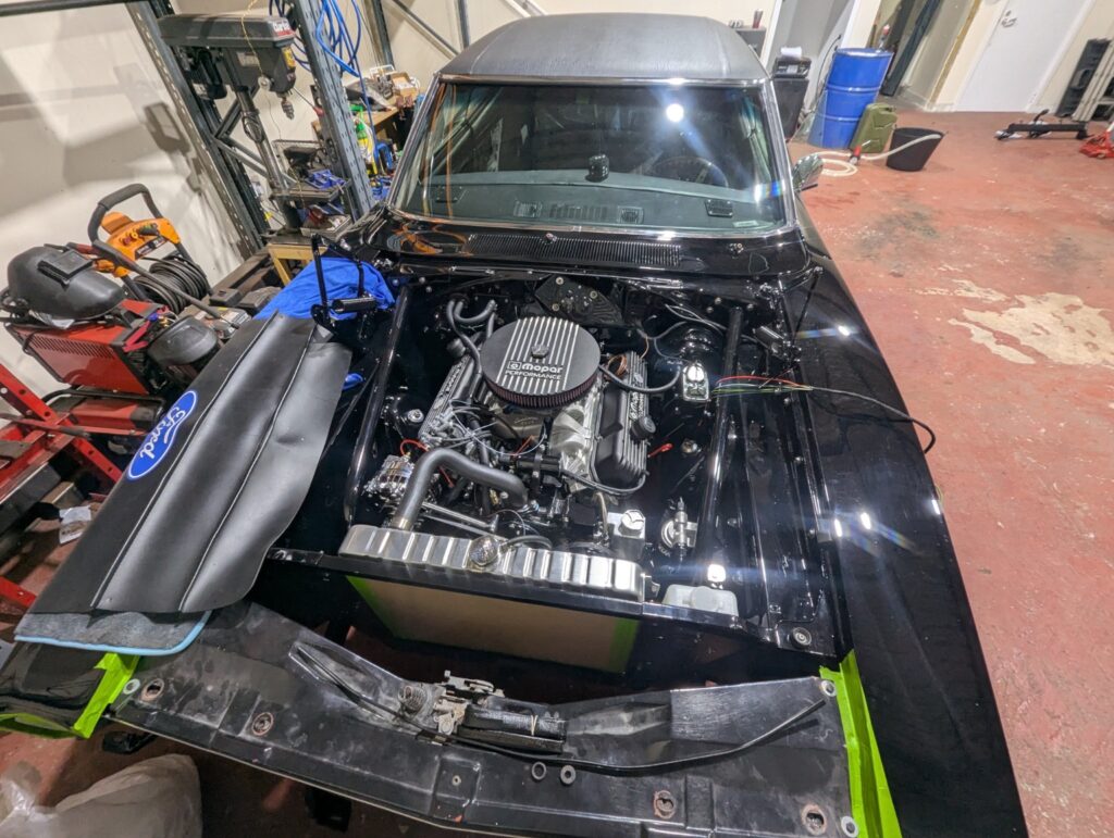 Dodge Charger engine bay during rewiring