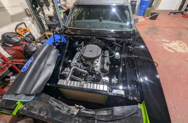 Dodge Charger engine bay during rewiring