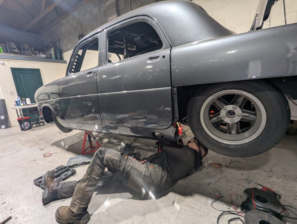 James working on wiring beneath the Mk1 Ford Zodiac